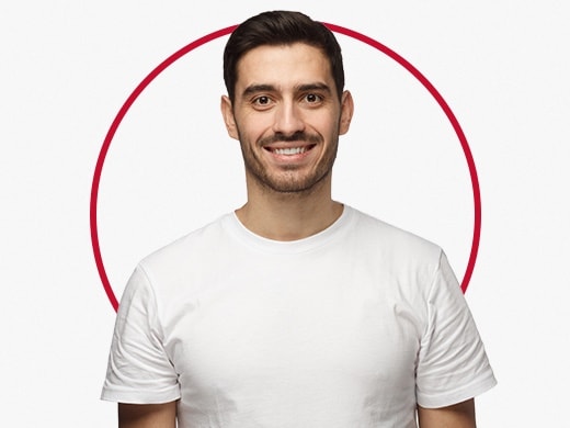 Smiling man in white T-shirt happy after Canesten jock itch treatment